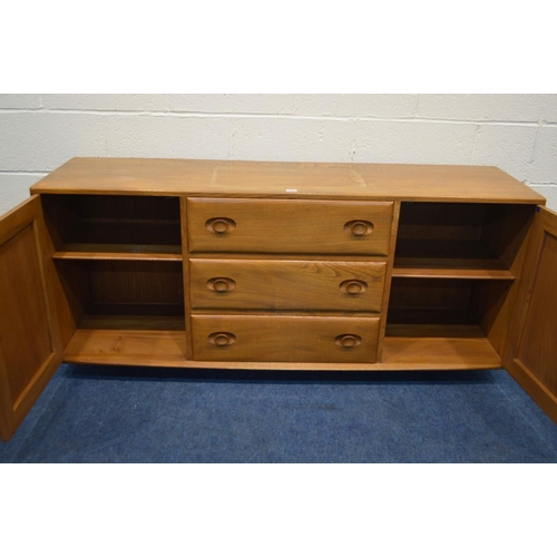 1334 - AN ERCOL WINDSOR MODEL 455 BLONDE ELM SIDEBOARD, three central drawers, the top drawer with a separa... 