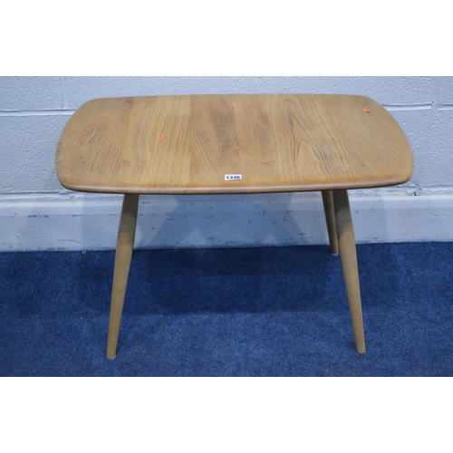 1336 - AN ERCOL MODEL 748 BLONDE ELM AND BEECH OCCASIONAL TABLE, on cylindrical tapering legs, width 72cm x... 