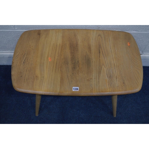 1336 - AN ERCOL MODEL 748 BLONDE ELM AND BEECH OCCASIONAL TABLE, on cylindrical tapering legs, width 72cm x... 