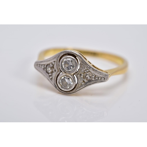 14 - AN EARLY 20TH CENTURY DIAMOND RING, of art deco style, set with two central round brilliant cut diam... 