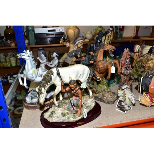 429 - FIFTEEN RESIN AND PLASTER FIGURES AND WALL MASKS OF NATIVE AMERICAN INDIANS, ETC, including pieces f... 