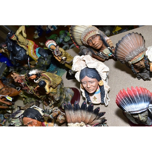 429 - FIFTEEN RESIN AND PLASTER FIGURES AND WALL MASKS OF NATIVE AMERICAN INDIANS, ETC, including pieces f... 