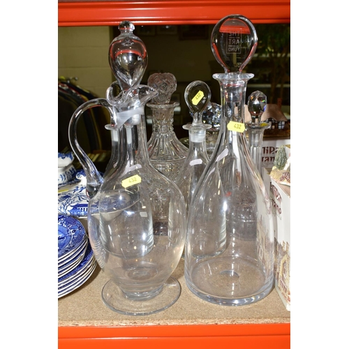 432 - NINE GLASS DECANTERS AND A GLASS CLARET JUG WITH STOPPER, including a pair of George III style with ... 