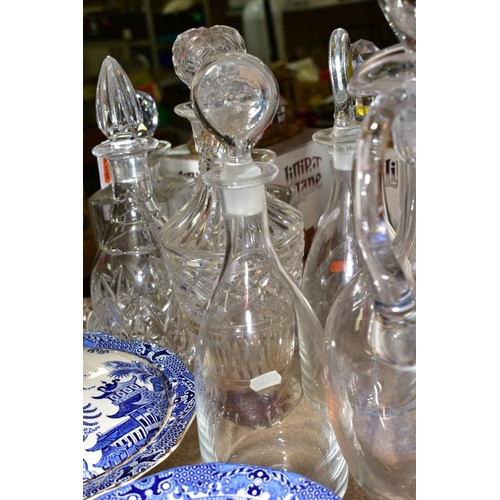 432 - NINE GLASS DECANTERS AND A GLASS CLARET JUG WITH STOPPER, including a pair of George III style with ... 