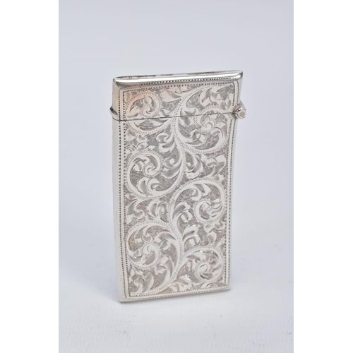 44 - AN EDWARDIAN SILVER CARD CASE, of curved rectangular form, scroll and floral detailing to both sides... 