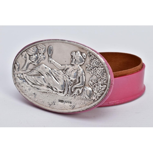 45 - A SILVER LIDDED PINK BOX, of oval form, depicting a lady holding a mirror scene to the silver lined ... 