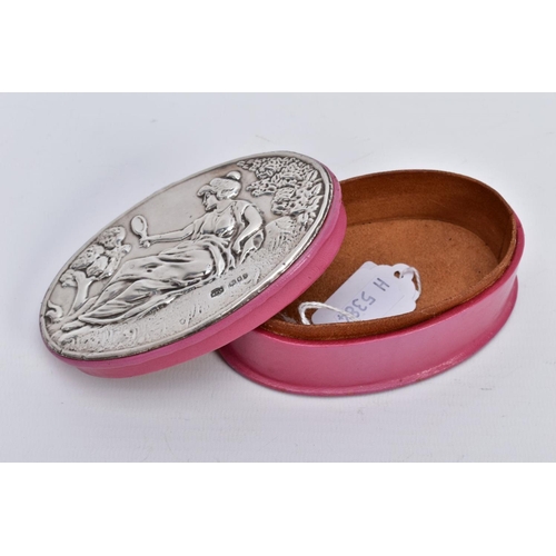 45 - A SILVER LIDDED PINK BOX, of oval form, depicting a lady holding a mirror scene to the silver lined ... 