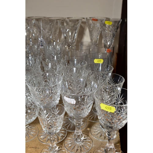 455 - A COLLECTION OF CUT GLASS DRINKING GLASSES, including tall Waterford Crystal wine glasses, including... 