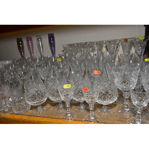 455 - A COLLECTION OF CUT GLASS DRINKING GLASSES, including tall Waterford Crystal wine glasses, including... 