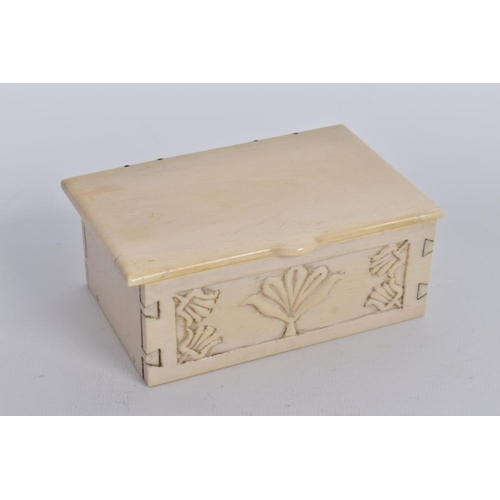 46 - A CARVED IVORY BOX, the rectangular hinged box, with an engraved floral design to the front panel, a... 