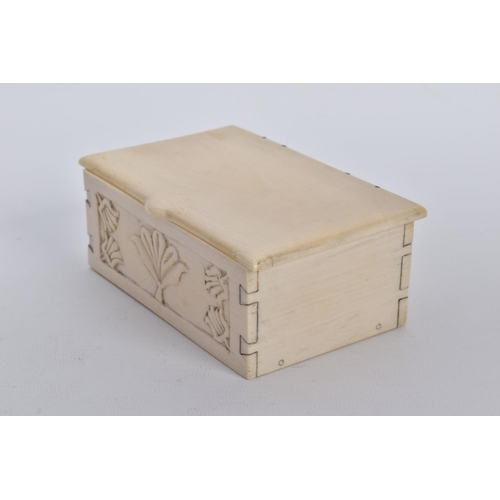 46 - A CARVED IVORY BOX, the rectangular hinged box, with an engraved floral design to the front panel, a... 