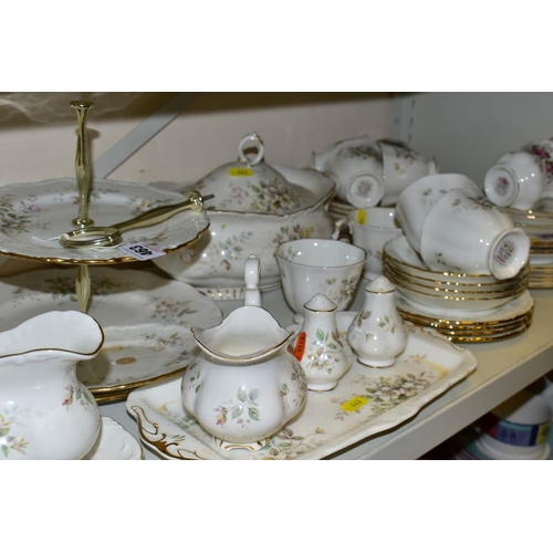 463 - A ROYAL ALBERT HAWORTH PATTERN DINNER SERVICE, comprising a three tier cake stand, a vegetable turee... 