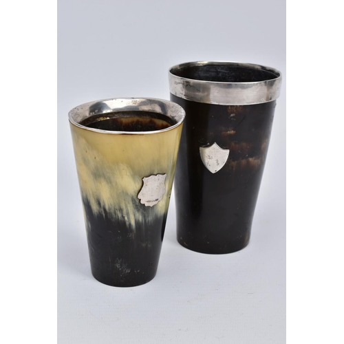 48 - TWO HORN BEAKERS, the first of brown and cream colour, with a silver vacant cartouche to the front a... 