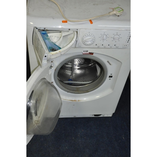 1132 - A HOTPOINT AQUARIUS WML540 WASHING MACHINE (PAT pass and powers up)