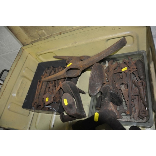 1134 - A METAL AMMO BOX CONTAINING VINTAG METALWARE including spanners, two shoe lasts, two kitchen mincers... 