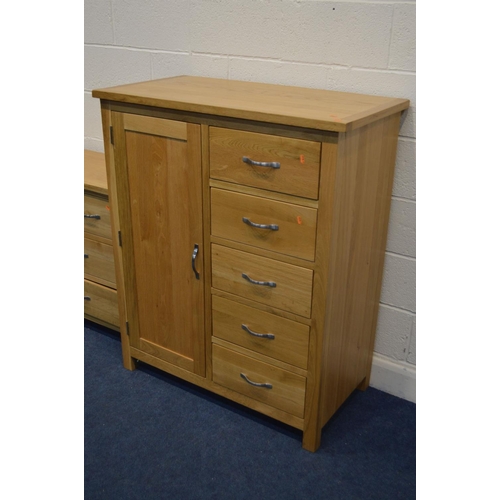 1201 - AN OAK FOUR PIECE BEDROOM SUITE, comprising a two door wardrobe with a single drawer, width 90cm x d... 