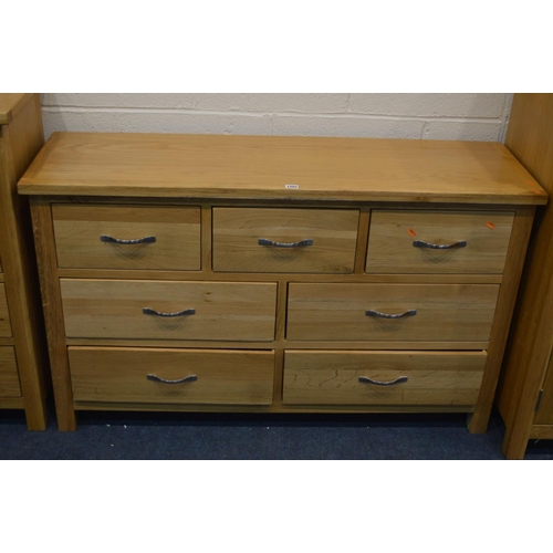 1201 - AN OAK FOUR PIECE BEDROOM SUITE, comprising a two door wardrobe with a single drawer, width 90cm x d... 