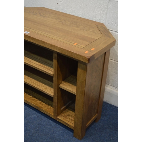 1202 - A GOLDEN OAK CORNER TV STAND, width 97cm x depth 50cm