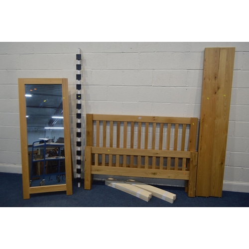 1204 - A LIGHT OAK 4' 6'' BEDFRAME, with side rails and slats, together with an oak full length mirror, on ... 