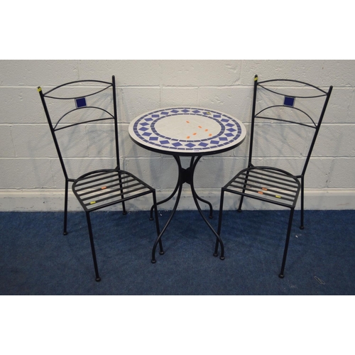 1206 - A MODERN WROUGHT IRON TILE TOP TABLE and four chairs (3)