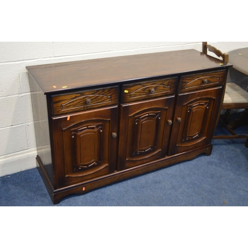 1207 - AN OAK GATE LEG TABLE, four ladder back chairs together with an oak sideboard (6)