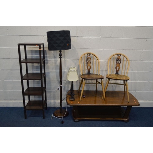 1208 - A PAIR OF ERCOL PRINCE OF WALES CHAIRS (partially stripped) together with an oak coffee table, a mod... 