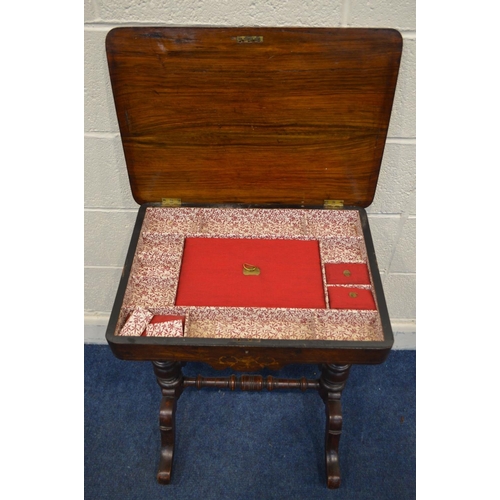 1214 - A LATE VICTORIAN WALNUT AND MARQUETRY INLAID WORK TABLE, the top enclosing fitted compartments, on t... 