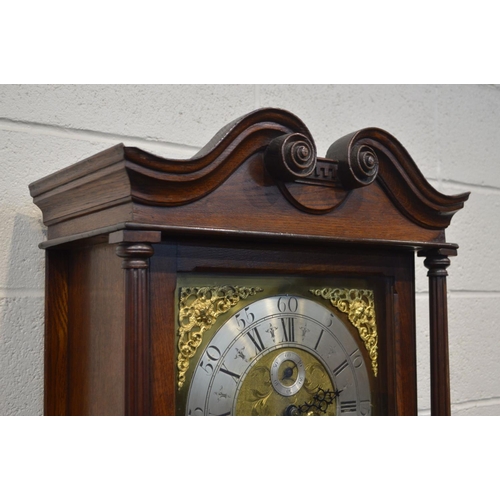 1230 - A GEORGE IV OAK AND CROSSBANDED EIGHT DAY LONGCASE CLOCK, the hood with a scrolled top and twin flut... 