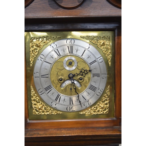 1230 - A GEORGE IV OAK AND CROSSBANDED EIGHT DAY LONGCASE CLOCK, the hood with a scrolled top and twin flut... 