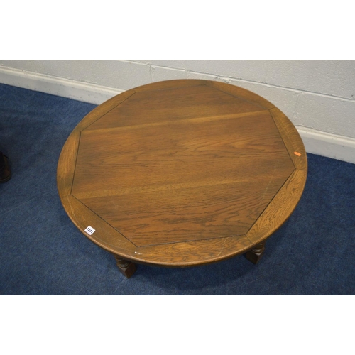 1241 - AN OLD CHARM OAK CIRCULAR COFFEE TABLE, on a cross stretchered base, diameter 99cm x height 48cm (mi... 