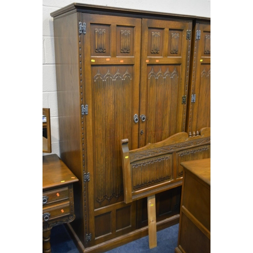 1246 - AN OLD CHARM OAK SIX PIECE BEDROOM SUITE, comprising two matching double door wardrobes, width 103cm... 