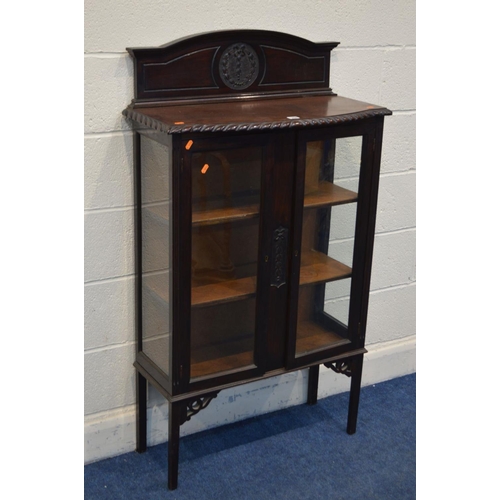 1268 - AN EARLY 20TH CENTURY MAHOGANY DOUBLE DOOR DISPLAY CABINET, with a raised back and two fixed shelves... 