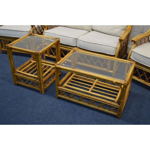 1275 - A WICKER FIVE PIECE CONSERVATORY SUITE, with oatmeal cushions, comprising a two seater settee, pair ... 