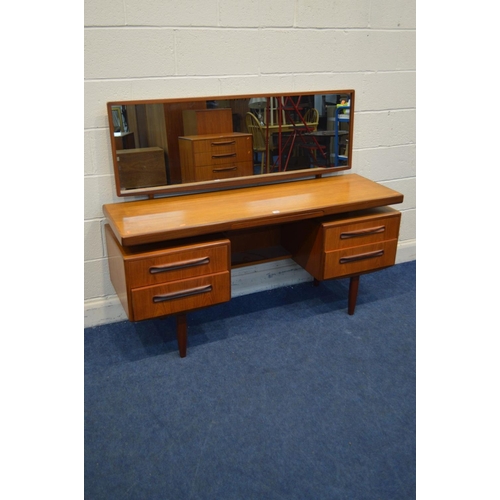 1280 - A G PLAN FRESCO TEAK DRESSING TABLE with a swinging rectangular mirror and four drawers flanking a d... 