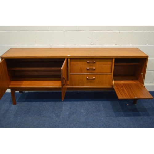 1282 - A G PLAN TEAK SIDEBOARD, with double cupboard doors and a single fall front cupboard door flanking t... 