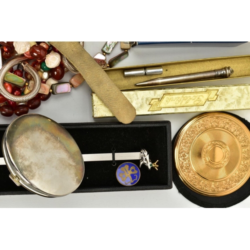 129 - A SELECTION OF ITEMS, to include a 'swiza' travel clock, a silver plated metal pencil with lead, bea... 