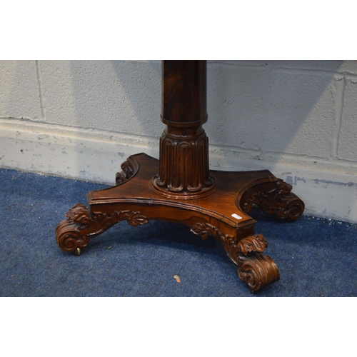 1297 - A 20TH CENTURY REGENCY STYLE ROSEWOOD CARD TABLE, rounded front corners with a fold over top, on a c... 