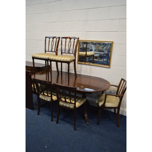 1302 - A STRONGBOW MAHOGANY TWIN PEDESTAL TABLE, on additional leaf, six chairs including two carvers, a ma... 