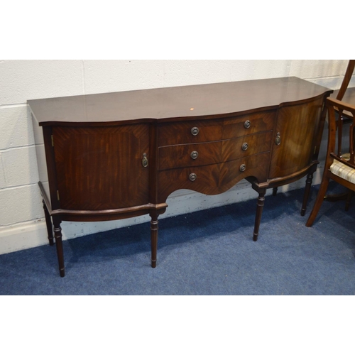 1302 - A STRONGBOW MAHOGANY TWIN PEDESTAL TABLE, on additional leaf, six chairs including two carvers, a ma... 