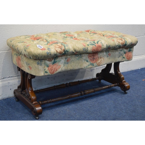 1310 - A VICTORIAN ROSEWOOD SERPENTINE STOOL, later floral buttoned upholstery, on twin foliate and scrolle... 