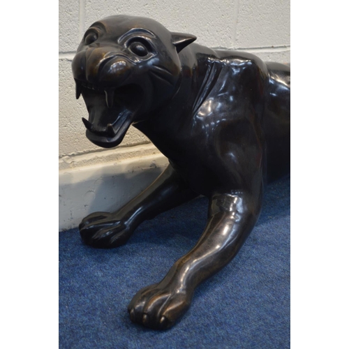 1316 - A BRONZE BLACK PANTHER SCULPTURE, length 159cm x height 49cm