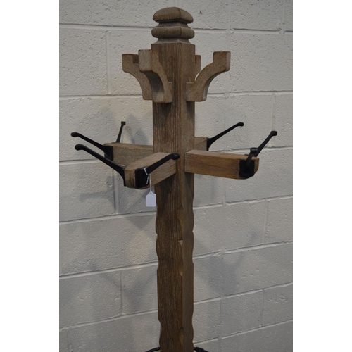 1317 - A LIMED OAK COAT/HAT STAND, height 199cm