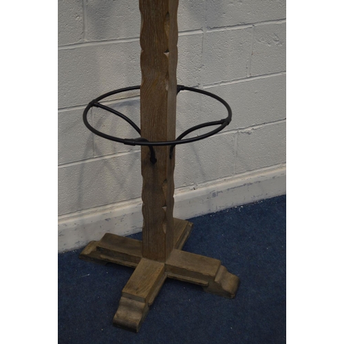 1317 - A LIMED OAK COAT/HAT STAND, height 199cm