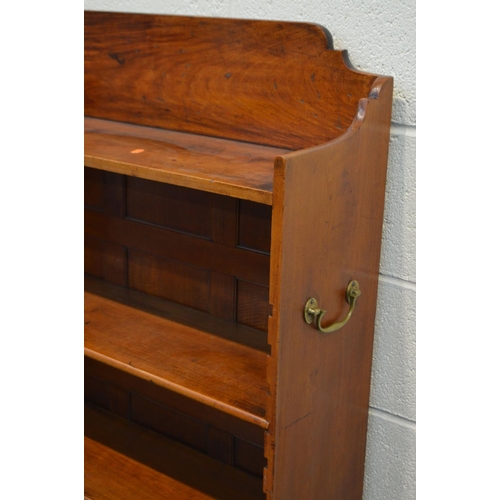 1319 - AN EARLY 20TH CENTURY MAHOGANY OPEN BOOKCASE, in the George III style, with a shaped top, two adjust... 