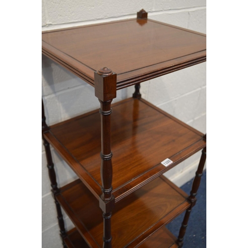 1320 - AN EDWARDIAN MAHOGANY FOUR TIER WHAT NOT, reeded edge to each tier united by turned uprights, on bra... 