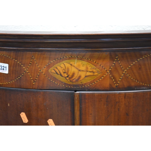 1321 - A GEORGIAN MAHOGANY AND INLAID BOWFRONT DOUBLE DOOR HANGING CORNER CUPBOARD, painted interior above ... 