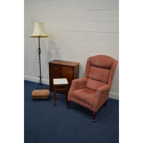 1326 - A HSL PINK UPHOLSTERED WING BACK ARMCHAIR, mahogany two door cabinet, wrought iron standard lamp and... 