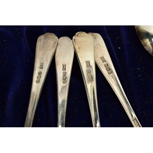 146 - A CASED SET OF SIX GOLFING TEASPOONS, each plain polished teaspoon, embossed with golfing clubs and ... 