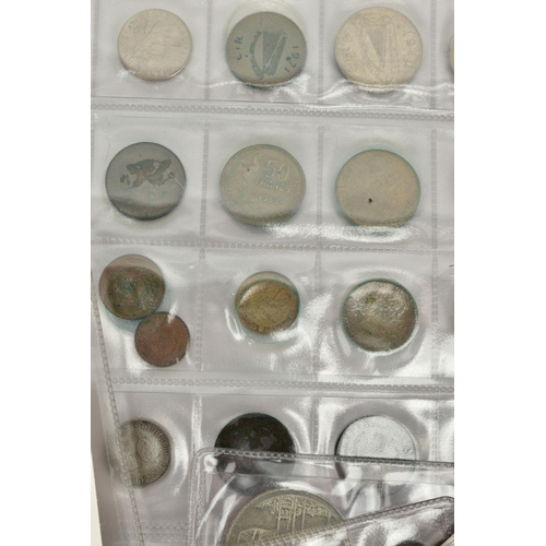 147 - A SHOEBOX OF WORLD COINS to include Royal Mint carded coins, five and two pound coins, eighty nine y... 