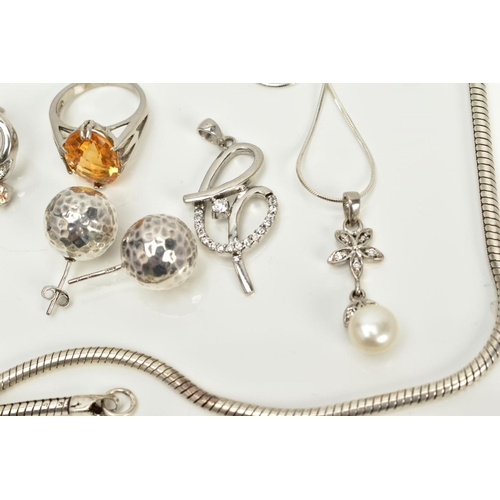 15 - A COLLECTION OF WHITE METAL ASSORTED JEWELLERY ITEMS to include an orange crystal and cubic zirconia... 